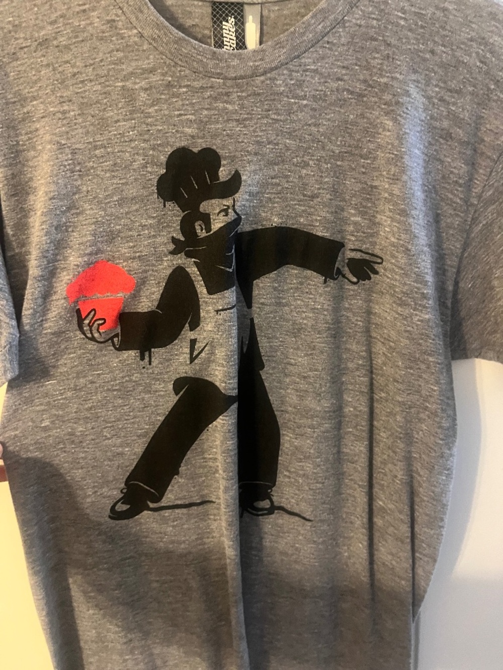 Johnny cupcakes banksy